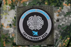 rond insigne van CAX CyberNet 2025.