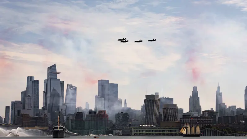 4 toestellen van het type F-35 boven wolkenkrabbers.
