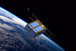 Een satelliet hangt boven de aarde. 
