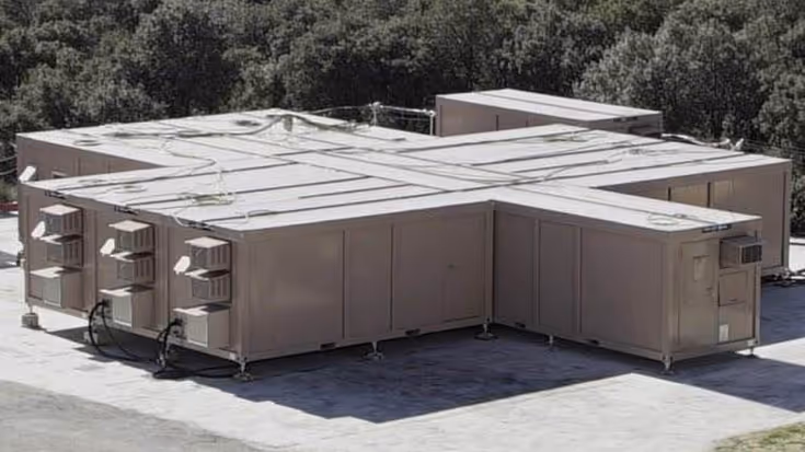 Met elkaar verbonden containers van bovenaf gezien.