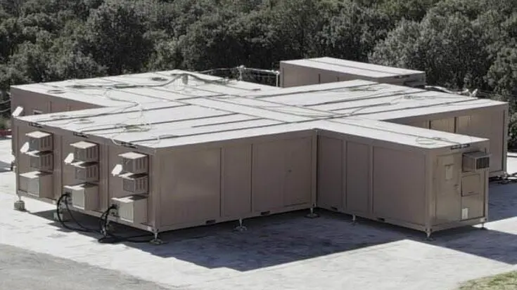 Met elkaar verbonden containers van bovenaf gezien.