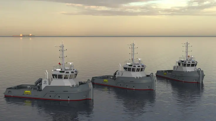 3 grijze sleepboten met witte kajuit in het water met de neuzen naar rechts.